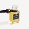 Anhänger in Form einer Parfüm-Miniaturflasche in Schwarz Anhänger in Form einer Parfüm-Miniaturflasche in Schwarz