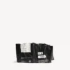 Chips Clutch-Geldbörse in Schwarz Chips Clutch-Geldbörse in Schwarz