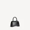 Damen-Handtasche „Hourglass“ XS in Schwarz Damen-Handtasche „Hourglass“ XS in Schwarz
