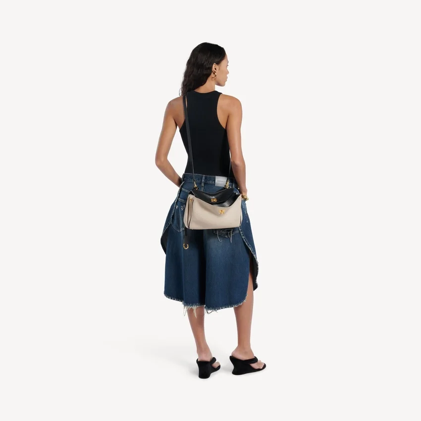 Damen-Handtasche „Rodeo“ klein in Beige/Schwarz Damen-Handtasche „Rodeo“ klein in Beige/Schwarz