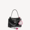 Damen-Handtasche „Rodeo“ klein mit Anhängern in Schwarz Damen-Handtasche „Rodeo“ klein mit Anhängern in Schwarz