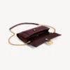 Damen-Pochette in Hourglass-Form mit Kette in dunklem Burgunderrot Damen-Pochette in Hourglass-Form mit Kette in dunklem Burgunderrot