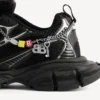 Damen-Sneaker in 3XL mit Anhängern in Schwarz/Silber Damen-Sneaker in 3XL mit Anhängern in Schwarz/Silber