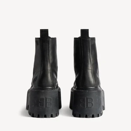 Damen-Stiefeletten „Strike“ mit Plateau in Schwarz Damen-Stiefeletten „Strike“ mit Plateau in Schwarz