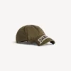 Herren-Kappe mit Masking-Tape-Motiv in Khaki Herren-Kappe mit Masking-Tape-Motiv in Khaki