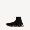 Herren-Sneaker „Speed 2.0“ mit vollständig transparenter Sohle aus recyceltem Strick in Schwarz/Orange Herren-Sneaker „Speed 2.0“ mit vollständig transparenter Sohle aus recyceltem Strick in Schwarz/Orange