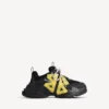 Damen-Sneaker „Triple S Tape Type“ in Schwarz/Gelb Damen-Sneaker „Triple S Tape Type“ in Schwarz/Gelb