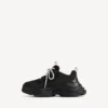 Damen-Sneaker „Triple S Tape Type“ in Schwarz/Gelb Damen-Sneaker „Triple S Tape Type“ in Schwarz/Gelb