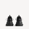 Damen-Sneaker „Triple S Tape Type“ in Schwarz/Gelb Damen-Sneaker „Triple S Tape Type“ in Schwarz/Gelb