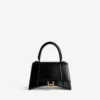 Kleine Damenhandtasche in Hourglass-Form in Schwarz Kleine Damenhandtasche in Hourglass-Form in Schwarz
