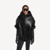 Locker sitzender Damen-Hoodie in Schwarz Locker sitzender Damen-Hoodie in Schwarz