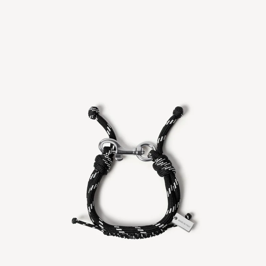 Malibu-Kordelarmband in Schwarz/Weiß/Glänzendem Silber Malibu-Kordelarmband in Schwarz/Weiß/Glänzendem Silber