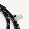 Malibu-Kordelarmband in Schwarz/Weiß/Glänzendem Silber Malibu-Kordelarmband in Schwarz/Weiß/Glänzendem Silber