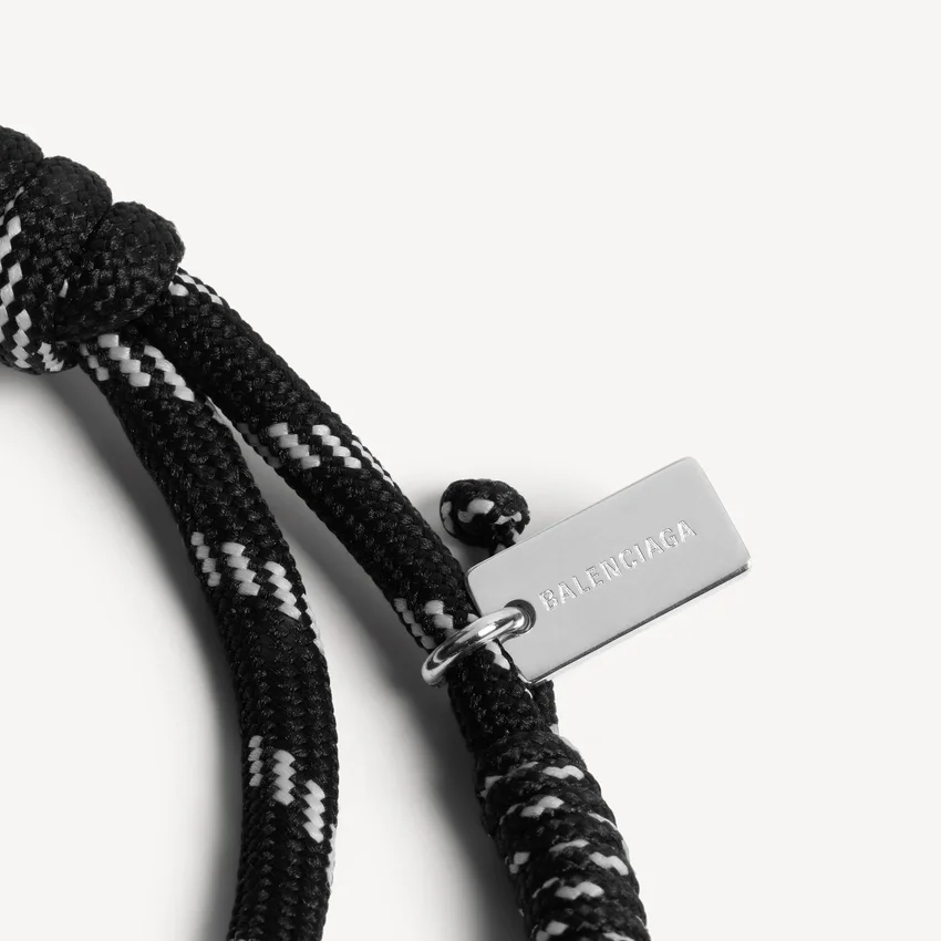 Malibu-Kordelarmband in Schwarz/Weiß/Glänzendem Silber Malibu-Kordelarmband in Schwarz/Weiß/Glänzendem Silber